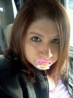ohshewets:  Sitting in the truck just bought a new paci. Happy girl! 