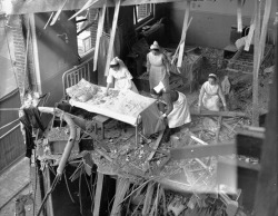 sinuses:  Nurses are seen clearing debris from one of the wards in St. Peter’s Hospital, Stepney, East London, on April 19, 1941. Four hospitals were among the buildings hit by German bombs during a full scale attack on the British capital. 