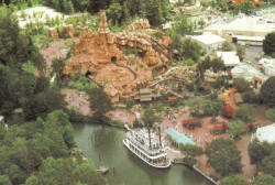  Aerial photo of Big Thunder Mountain Railroad at Disneyland. This is prior to construction of the Big Thunder Ranch and Festival Arena, which would take up the cleared/partly grassy space at the back left of photo. The three ‘isolated’ rock structures