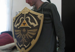 otlgaming:  WOODEN HYLIAN SHIELD FROM LEGEND OF ZELDA Paulo Vinícius D. Horstma (aka clefrayearth) posted these photos of his latest woodworking project: a life-sized wooden Hylian Shield from Legend of Zelda!  Paulo is one talented craftsman after