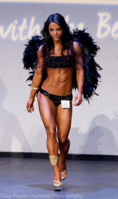 areaorion:  Muscle Angel Andreia Brazier WBFF Physique Athlete Andreia Brazier looks magnificently angelic on stage… wings or not.