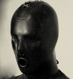 life-as-slave:  The advantages of a rubber identity are that it is always stable. No emotions, always a predictable facial expression and always the same functionality of the mouth pussy.  That’s why Master Thomas got used to it very quickly and no